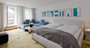 Postel nebo postele na pokoji v ubytování Hotel Forstinger - Boutique Hotel Schärding
