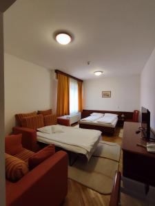 Postel nebo postele na pokoji v ubytování Hotel M3