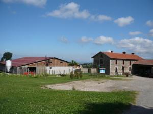 an old house and a barn in a field at Gîte Saint-Héand, 2 pièces, 2 personnes - FR-1-496-144 in Saint-Héand