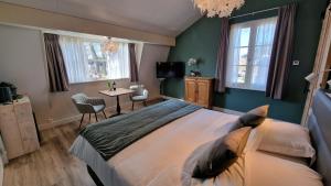 Postel nebo postele na pokoji v ubytování B&B De Droomhoeve
