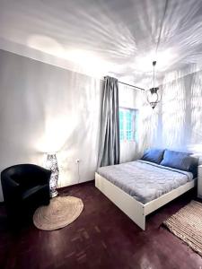 Postel nebo postele na pokoji v ubytování MorabezaHome- Apartment Tati