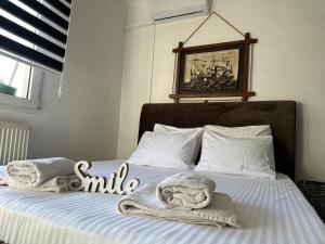 Postel nebo postele na pokoji v ubytování Zigana Apartments