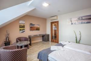 Postel nebo postele na pokoji v ubytování Hotel Beta