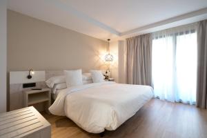 Кровать или кровати в номере Óbal Hotel Marbella