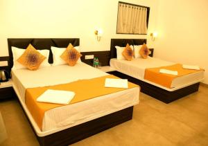 Voodi või voodid majutusasutuse Basil Leaf Resort toas
