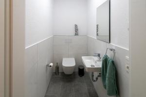 Koupelna v ubytování Seeperle + 19 fotografií