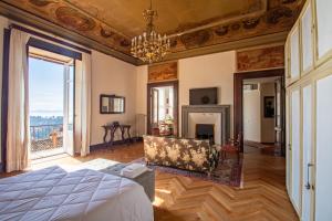 Postel nebo postele na pokoji v ubytování Belvedere Suite - Centro Storico - Terrazzo con Vista