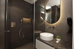 Koupelna v ubytování Gremmy Boutique Hotel