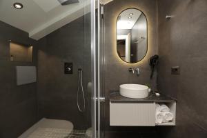 Koupelna v ubytování Gremmy Boutique Hotel