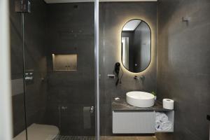Koupelna v ubytování Gremmy Boutique Hotel