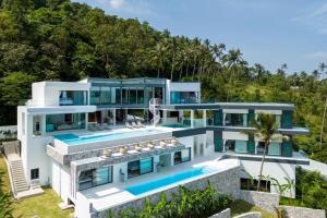 an aerial view of a villa with a swimming pool at Villa Murano Samui in Amphoe Koh Samui