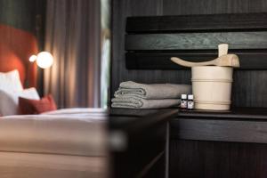 Postel nebo postele na pokoji v ubytování Goldstück - Adults Only