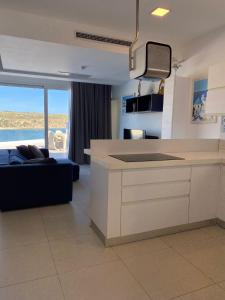 Η κουζίνα ή μικρή κουζίνα στο DUPLEX PENTHOUSE