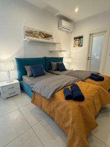 Ένα ή περισσότερα κρεβάτια σε δωμάτιο στο DUPLEX PENTHOUSE