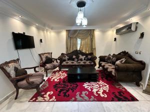 Posezení v ubytování Pharaohs Rooms + 16 fotografií