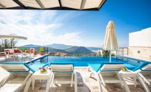 a villa with a pool and a view at Villa Eslem in Kas