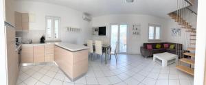 Kuchyňa alebo kuchynka v ubytovaní Residence Amore