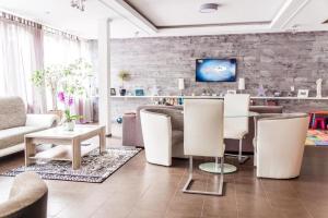 TV a/nebo společenská místnost v ubytování Schwanen-Resort
