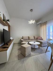 Μια τηλεόραση ή/και κέντρο ψυχαγωγίας στο Apartment Magnolia