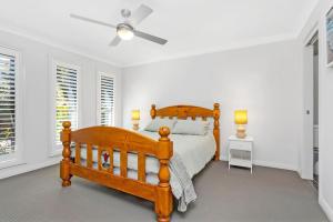 Ένα ή περισσότερα κρεβάτια σε δωμάτιο στο Shoreline Retreat +16 φωτογραφίες