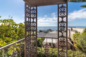 a view of the ocean from the balcony of a house at MAGICAL COTTAGE DIRECT OCEAN VIEW BEACH W GARAGE, YARD, FIREPLACE in Laguna Beach