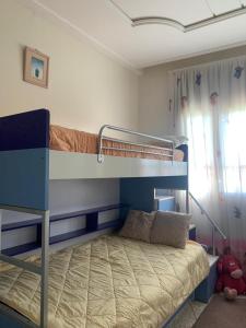 a bedroom with two bunk beds in a room at Appartement meublé à louer in Meknès