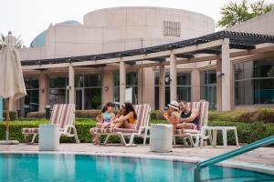 Bazén v ubytování eStay Hotel nebo v jeho okolí