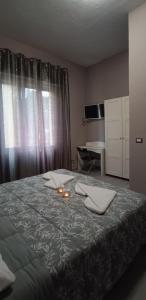 Een bed of bedden in een kamer bij Cris&Giuli House