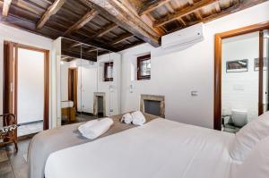 Posteľ alebo postele v izbe v ubytovaní Chiavari Apartment