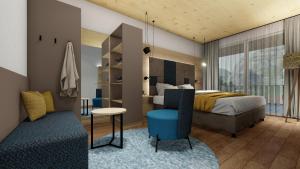 um quarto com uma cama, uma mesa e uma cadeira em Hotel zum Schwanen - Appartement 6 em Pflach