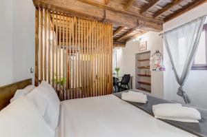 Posteľ alebo postele v izbe v ubytovaní Chiavari Apartment + 37 fotografií