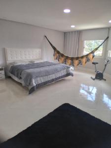 Ένα ή περισσότερα κρεβάτια σε δωμάτιο στο Casa da pedra +30 φωτογραφίες