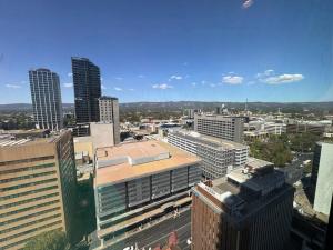 an aerial view of a city with tall buildings at The Forest in the heart of CBD in Adelaide