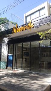 a sign on the front of a building at Nómade Hostel mdz in Mendoza