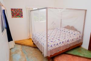 Postel nebo postele na pokoji v ubytování Las Mariposas