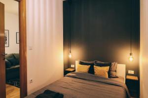 Ένα ή περισσότερα κρεβάτια σε δωμάτιο στο Stylish Haven: Designer Retreat