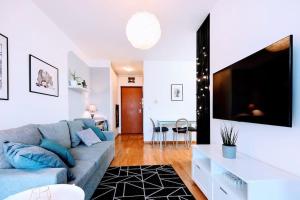 Μια τηλεόραση ή/και κέντρο ψυχαγωγίας στο Stylish Haven: Designer Retreat