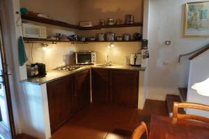 Kuchyň nebo kuchyňský kout v ubytování CASA LIMONE