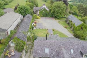 an aerial view of a house with a driveway at Thyme Lodge Drefach Felindre in Felindre