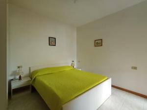 En eller flere senge i et værelse på Nelly house - con piscina e posto auto al coperto + 4 billeder