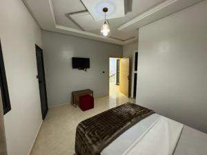 Uma cama ou camas num quarto em Hotel Ahmed Ali