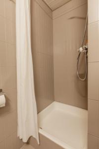 Koupelna v ubytování Superbe appartement avec piscine