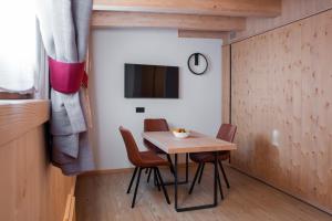 Sjónvarps- og/eða afþreyingartæki á Chalet al Tabià