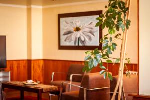 Uma área de estar em Hotel Villa Brescia