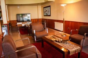 Uma área de estar em Hotel Villa Brescia