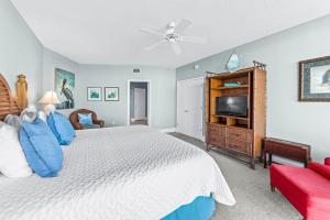 Postel nebo postele na pokoji v ubytování Caribe Resort Unit B603