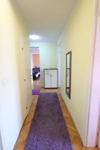 Postel nebo postele na pokoji v ubytování APARTMANI SARA