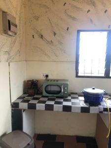 Kuchnia lub aneks kuchenny w obiekcie Kin Nkechi’s Residence