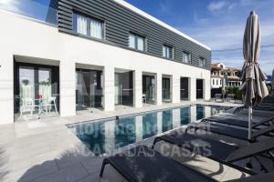 Villa con piscina y casa en Bluevillas Ribamar T1 by ACasaDasCasas - Apartment 1, en Ericeira