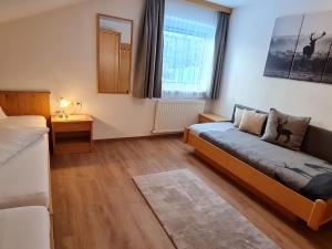 Posteľ alebo postele v izbe v ubytovaní Apartment Walch-1 by Interhome